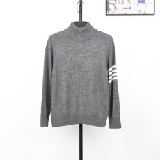 톰브라운 반집업 니트