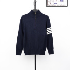 톰브라운 반집업 니트